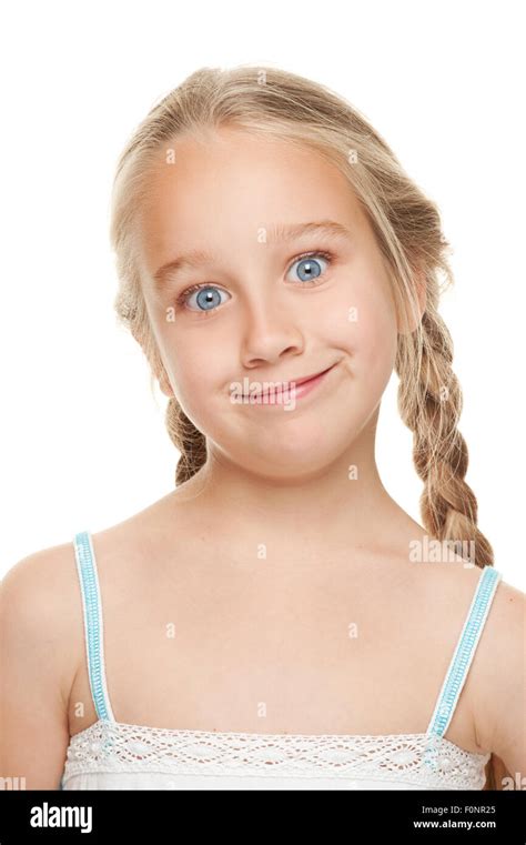 Little girl making funny face Stock Photo - Alamy