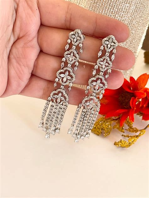 Update more than 153 fancy american diamond earrings latest - seven.edu.vn