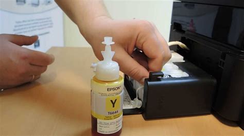 Adding ink from original bottle to EPSON L550 ink tank - YouTube