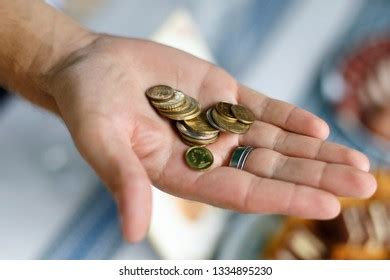 Close Hand Holding Coins Stock Photo 1334895230 | Shutterstock