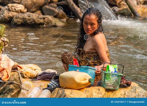 Bathing in a river Laos editorial photography. Image of children - 125318317