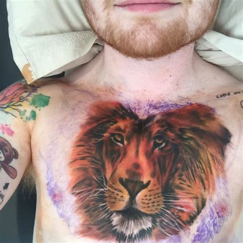 Lion tattoo on Ed Sheeran's chest.