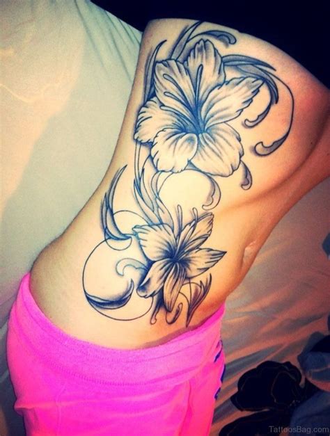 Grey Lily Tattoo On Back #Tattoosforwomen | Lily tattoo design, Lillies tattoo, Tattoos