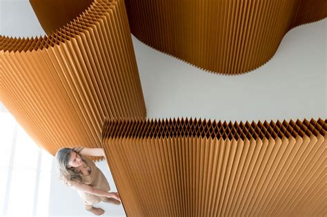 These flexible wooden room partitions expand up to 15 feet while ...