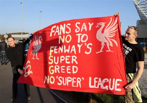 In pictures: Leeds United and Liverpool fans join forces for European Super League protest ...