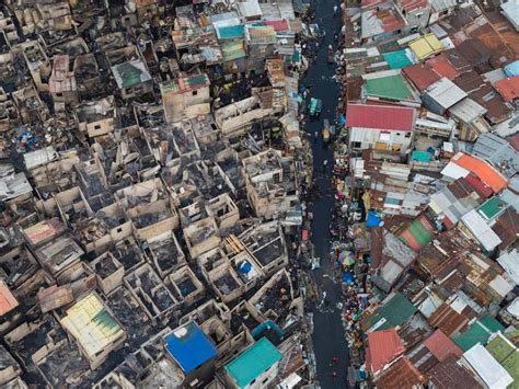 Revealing aerial photos of Manila’s slums show homes packed tightly ...