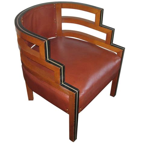 1930's Wood and Leather Upholstered Chair from 1st dibs