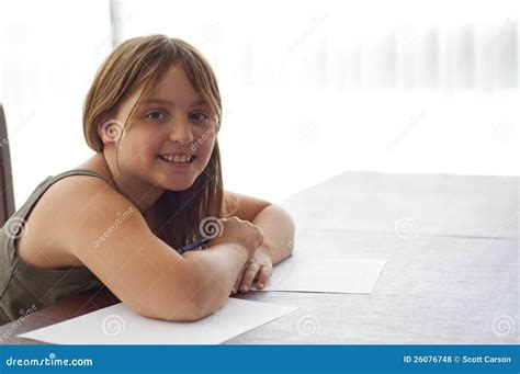 Young Girl Doing Homework at Kitchen Table Stock Photo - Image of book, childhood: 26076748