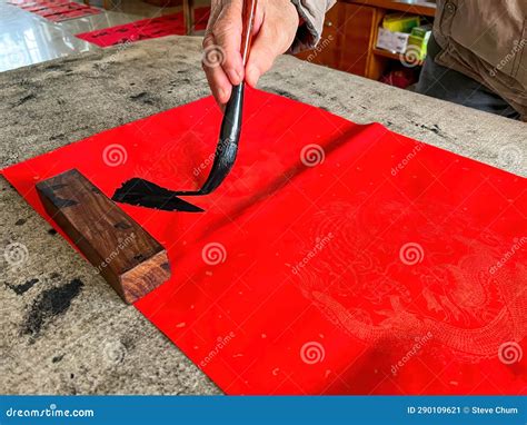 A Calligrapher is Creating and Writing Spring Festival Couplets, Chinese New Year Spring ...