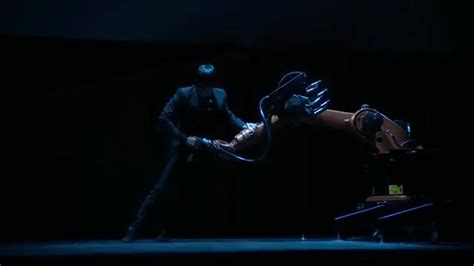 Dancer Performs a Gorgeous Ballet With a Responsive Reticulating Single Arm Robot