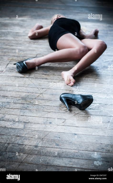 Dead woman on the floor Stock Photo - Alamy