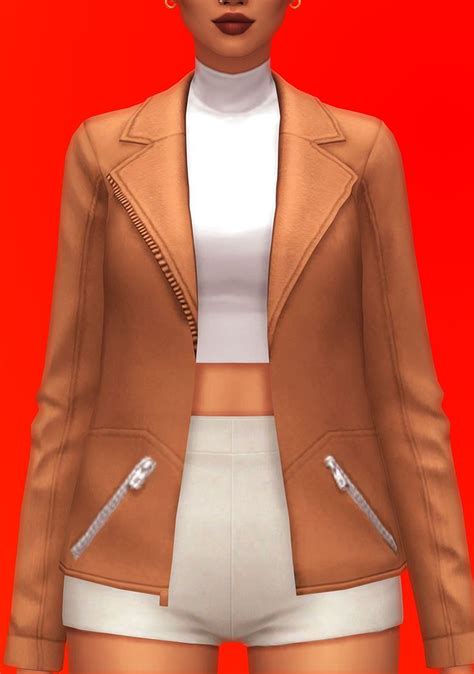 a woman in white shorts and a brown jacket with zippers on the front ...