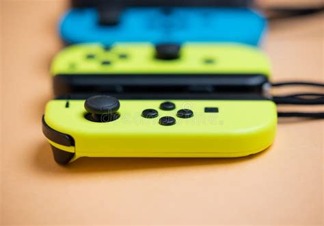 Nintendo Switch Joy-Cons Aligned in a Row. Yellow Blue and Red Joy-Cons ...