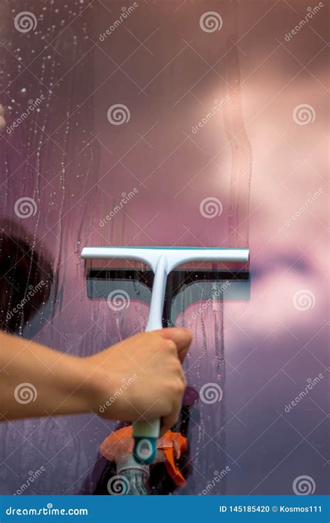 Male Hand - Glass Cleaning Tool Stock Photo - Image of home, detergent: 145185420