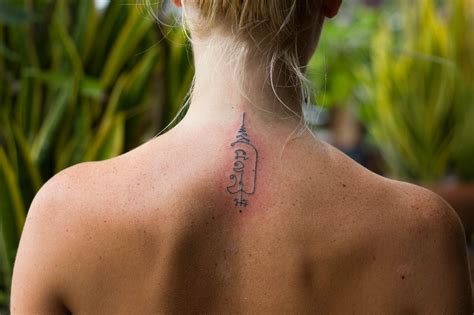 My girlfriend and I got a Khmer Tattoo in Thailand from a monk | Khmer tattoo, Cool tattoos, Tattoos