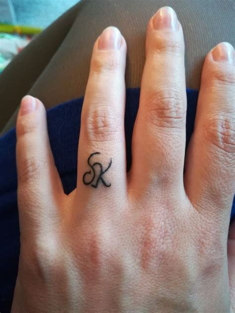 Ring Finger R Name Tattoo Designs