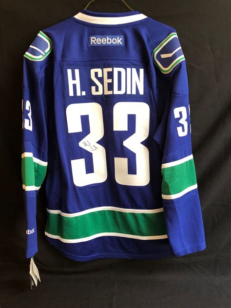 HENRIK SEDIN SIGNED REEBOK CANUCKS HOCKEY JERSEY