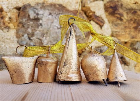 Set of 5 different shaped bronze metal cow bells Vintage | Etsy