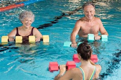 Seniors Doing Aqua Aerobics Stock Image - Image of swim, sport: 78376087