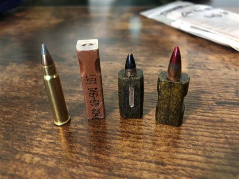 Different generations HK G11 Caseless Ammunition next to a .17 HMR for ...