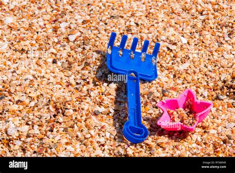 children's toys on the beach a sunny day Stock Photo - Alamy