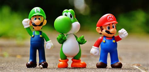 Focus Photo of Super Mario, Luigi, and Yoshi Figurines · Free Stock Photo