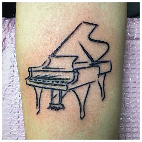 Black and White Piano Tattoo on Leg