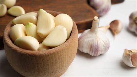 You Can Stop Peeling Your Garlic Before Pressing It. Here's Why