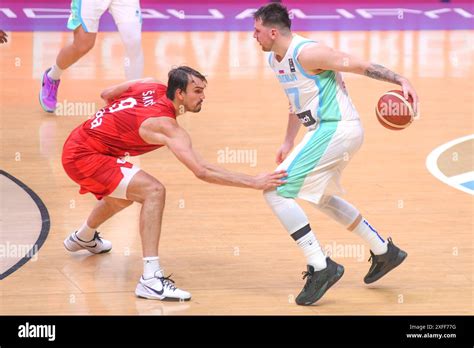 Luka Doncic (Slovenia) Dario Saric (Croatia). FIBA Olympic Qualifying Tournament. Piraeus 2024 ...