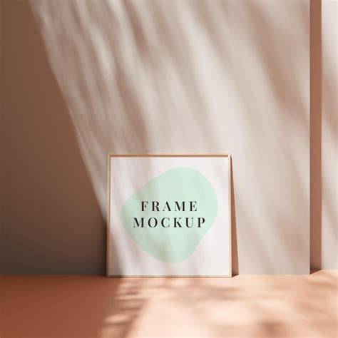 Premium PSD | Poster photo frame mockup leanings against the pastel wall on the floor with ...