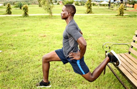 Athletic Man Doing Single Leg Split Squat On a Bench in The Park - High Quality Free Stock Images
