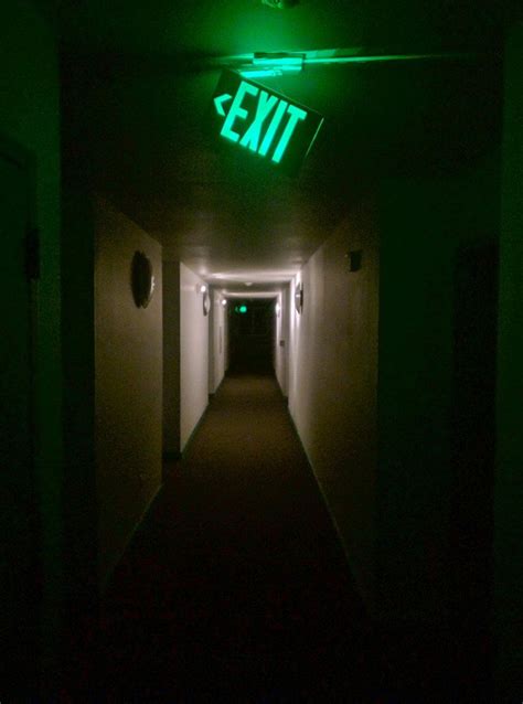 Green Exit Sign dangling in a eerie Hallway ~ Low Light Night Photography | Eerie photography ...