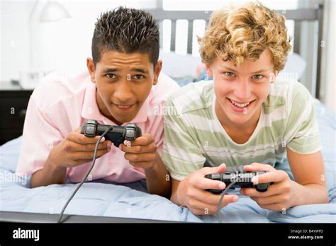 Teenage Boys Playing Video Games Stock Photo - Alamy