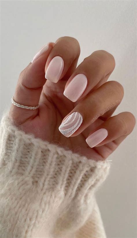 35 Nail Trends 2023 To Have on Your List : Nude Pink + White Swirl Nails