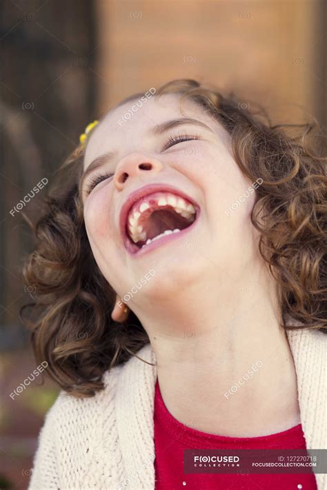 Little girl laughing — Focus On Foreground, 6 7 years - Stock Photo | #127270718