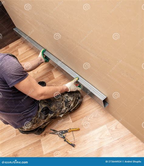 Workers Install Plasterboard Wall in the Room Stock Photo - Image of interior, site: 273644924