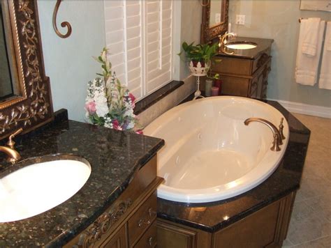 Tan Brown Granite Vanity and Tub Surround | Lowe's home improvement store, Tan brown granite ...