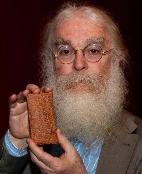 Dr. Irving Finkel with a 3,770-year-old tablet containing instructions from the god Enki to ...