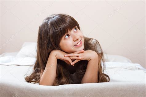 Little girl dreaming in bed — Stock Photo © inesbazdar #92424392