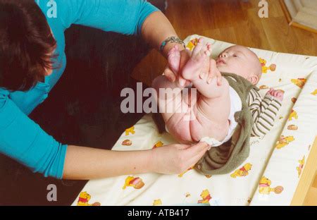 Mother changing a baby's nappy Stock Photo, Royalty Free Image: 21735724 - Alamy