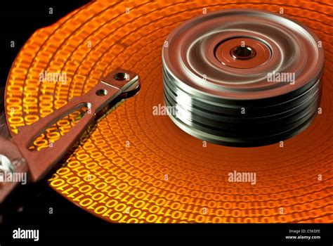 read data on hard disk with spinning hard disk Stock Photo - Alamy
