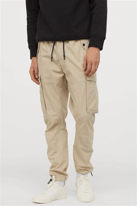 Cotton cargo trousers - Light beige - Men | H&M GB | Cotton cargo pants, Pants outfit men, Cargo ...