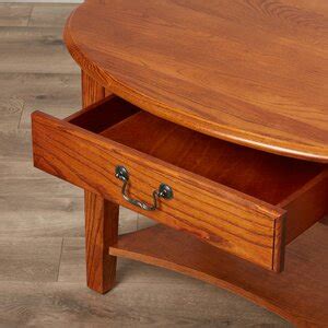Charlton Home® Oval Solid Wood Coffee Table & Reviews | Wayfair