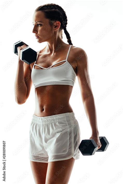 Fitness model doing bodybuilding workout Stock Photo | Adobe Stock