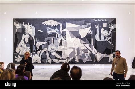 People looking the Guernica painting by Pablo Picasso. Museo Reina ...