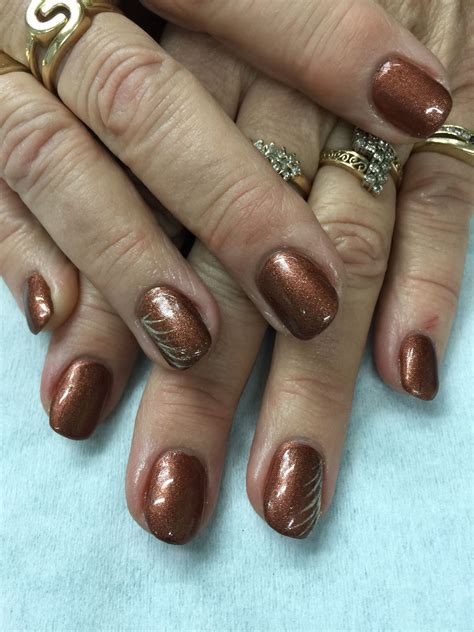 Cool copper brown gel nails with gold accents. All done with non-toxic ...