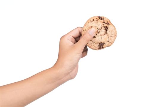 Premium Photo | Hand holding cookies Chocolate biscuits isolated on ...