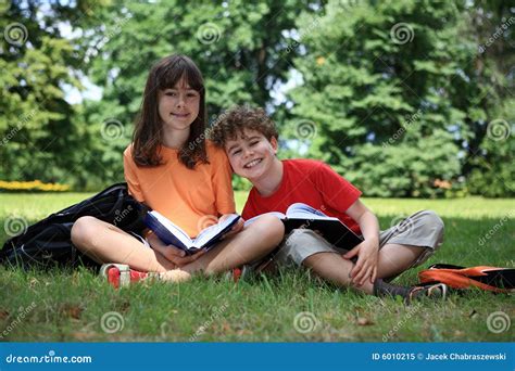 Kids reading books outdoor stock image. Image of outdoor - 6010215