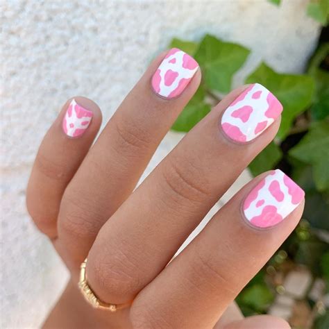 Samantha 🌹 on Instagram: “Strawberry milk cow print 🍓🥛🐄 base is @essie Blanc 🤍” Pastel Nails ...