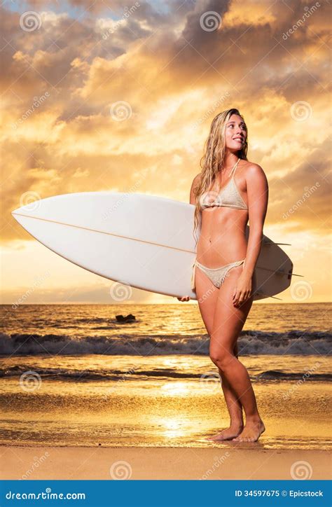 Surfer Girl On The Beach At Sunset Royalty Free Stock Photo - Image: 34597675